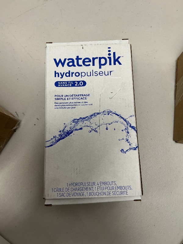 Photo 1 of Waterpik Cordless Advanced 2.0 Water Flosser For Teeth, Gums, Braces, Dental Care With Travel Bag and 4 Tips, ADA Accepted, Rechargeable, Portable, and Waterproof, Gray WP-587, Packaging May Vary