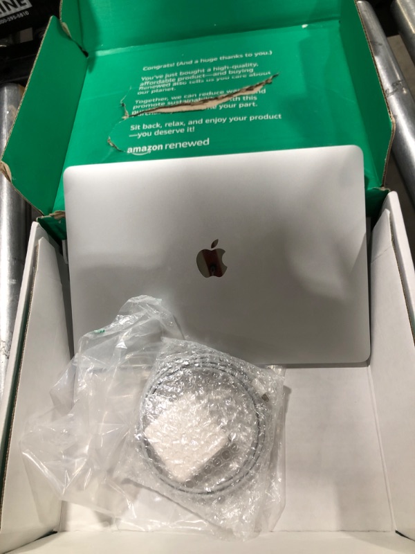 Photo 1 of Late 2020 Apple MacBook Air with Apple M1 Chip (13 inch, 8GB RAM, 256GB SSD) (QWERTY English) Silver (Renewed Premium)