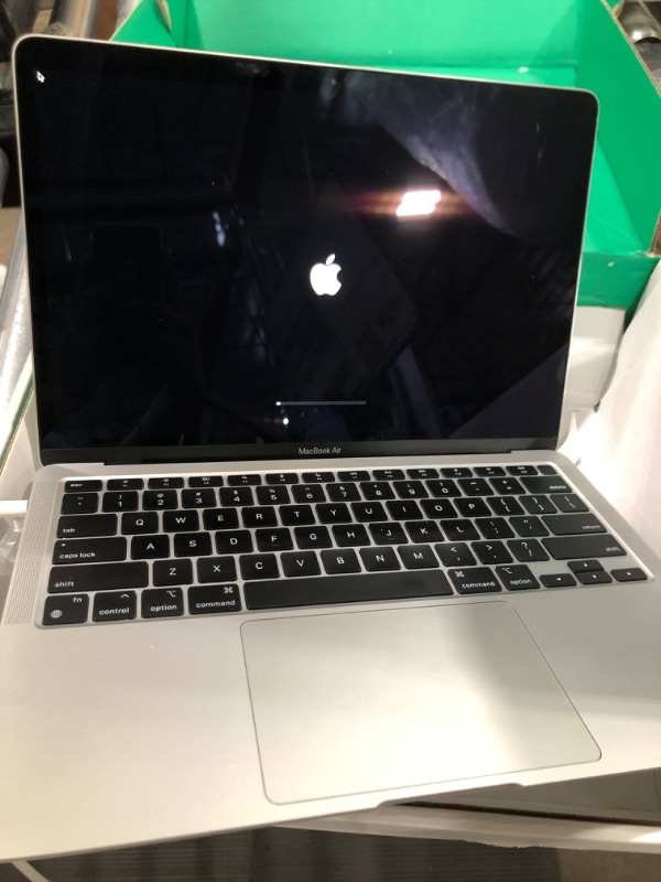 Photo 1 of Late 2020 Apple MacBook Air with Apple M1 Chip (13 inch, 8GB RAM, 256GB SSD) (QWERTY English) Silver (Renewed Premium)