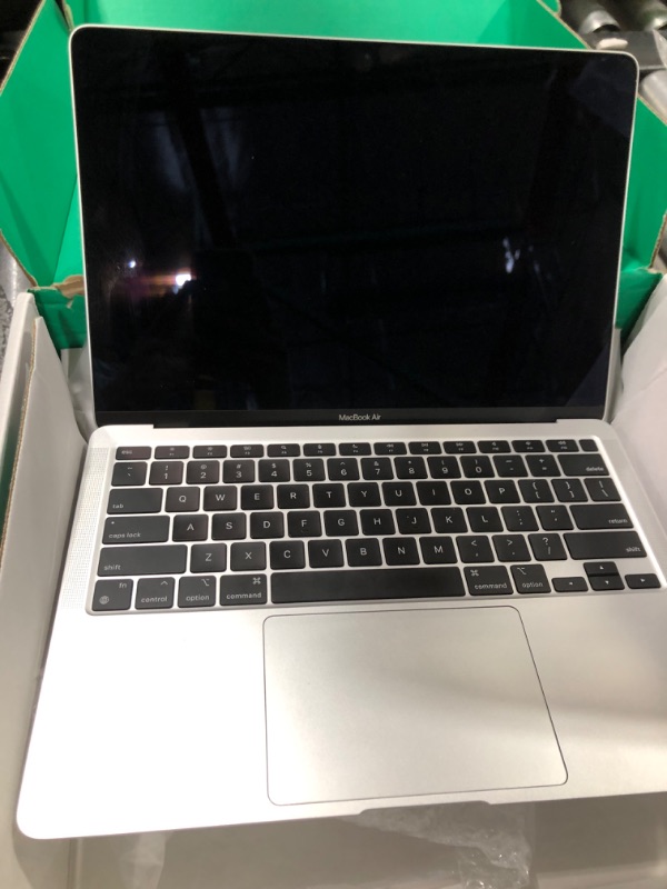 Photo 1 of Late 2020 Apple MacBook Air with Apple M1 Chip (13 inch, 8GB RAM, 256GB SSD) (QWERTY English) Silver (Renewed Premium)