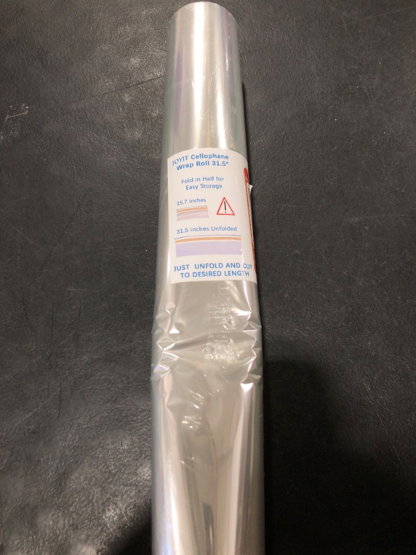 Photo 1 of 100 ft Clear Cellophane Wrap Roll (31.5 in x 100 ft) - 3 Mil Thicken Cellophane Roll, Clear Cellophane Bags Large, Clear Wrapping Paper for Flower Gift Baskets Wrap (31.5" fold into 16")