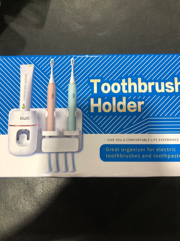 Photo 1 of Toothpaste Dispenser, Automatic Toothpaste Dispenser, Space-Saving Toothbrush Holder Wall Mounted for Bathroom, Toothpaste Squeezer, Electric ToothpasteDispenser for Kids with 4 Toothbrush Slots