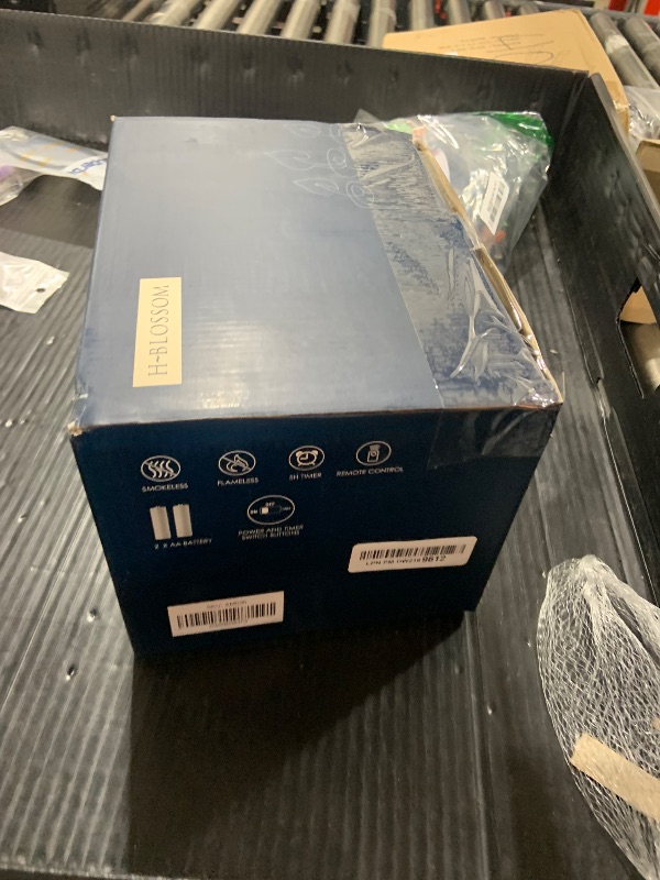 Photo 1 of H-BLOSSOM Flameless Candles Battery Operated Real Wax Pillar LED Candles with 10 Key Remote Control Cycling 24 Hours Timer Set of 6 (3" x 6" Remote)