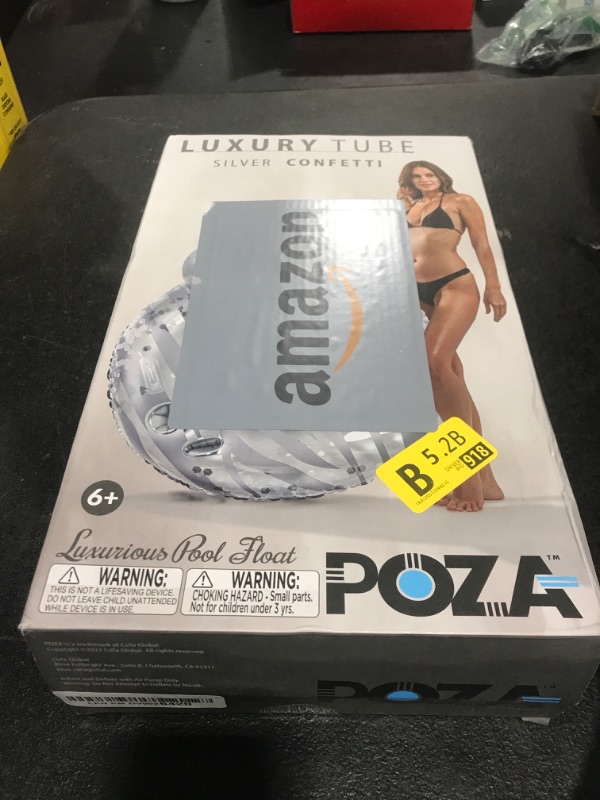 Photo 1 of POZA Silver Inflatable Luxury Tube with Back Rest - Big Luxurious Lounger Pool Float Tube Filled with Sparkle Confetti, Built in Phone Holder, Cup Holders, and Handles, Premium Thick Ring - 42 Inches