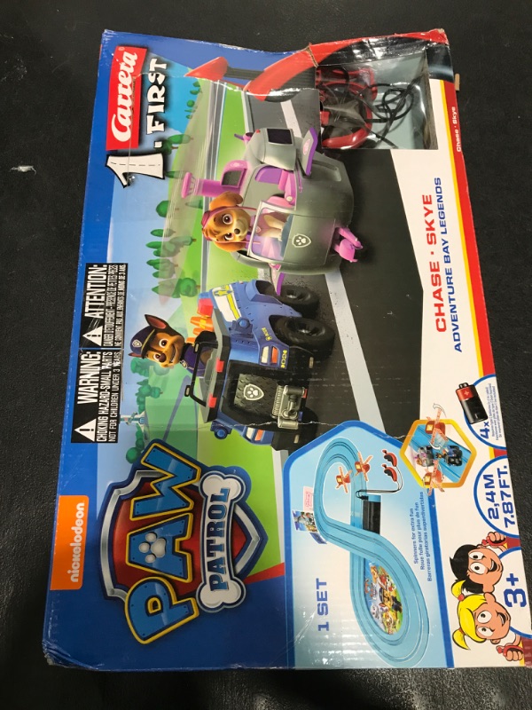 Photo 1 of Carrera First Paw Patrol - Slot Car Race Track - Includes 2 Cars: Chase and Skye - Battery-Powered Beginner Racing Set for Kids Ages 3 Years and Up,
