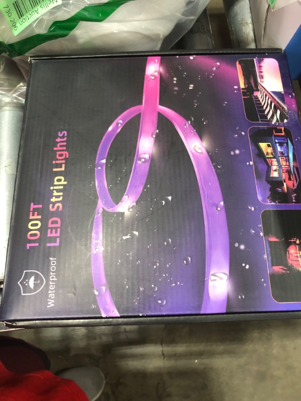 Photo 1 of 100 FT outdoor LED strip lights (2 rolls of 50 FT), IP65 waterproof, music synchronization RGB LED light, with 44 key remote control and application, used for outdoor, balcony, and roof decoration