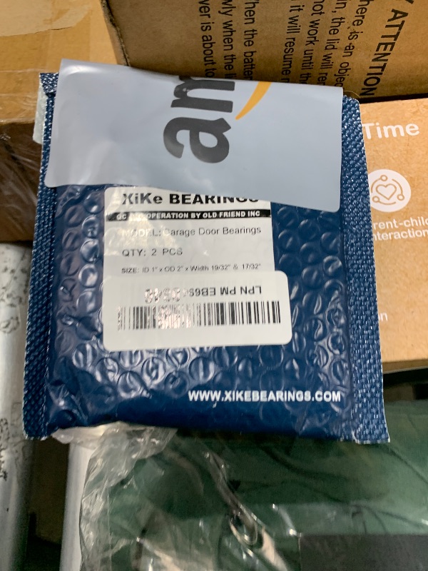 Photo 1 of XiKe 2 Pack Garage Door Torsion Spring Stamping Steel Bearing 1" ID x 2" OD, Used with Center Support Only.