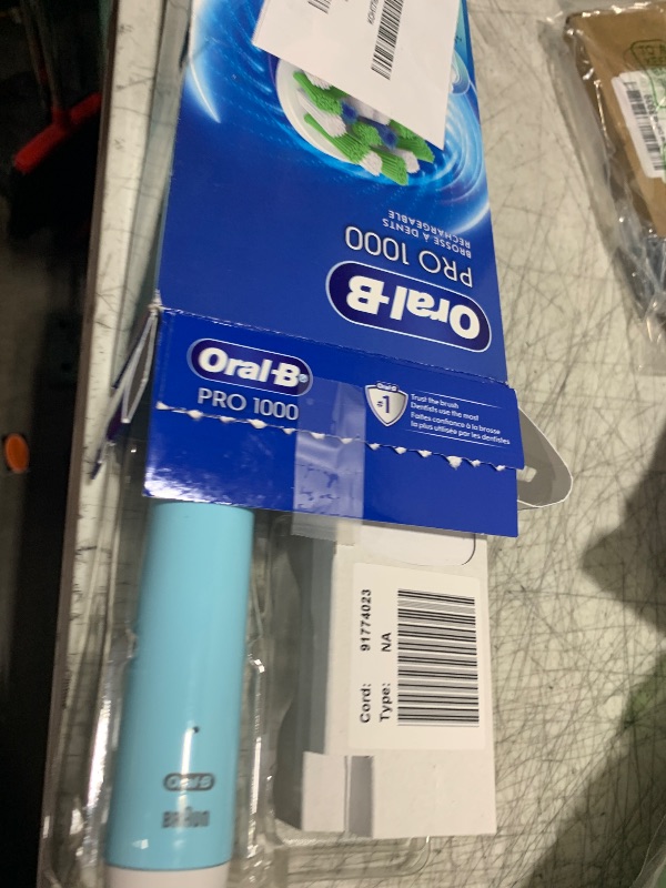Photo 1 of Oral-B Pro 1000 CrossAction Electric Toothbrush, Green