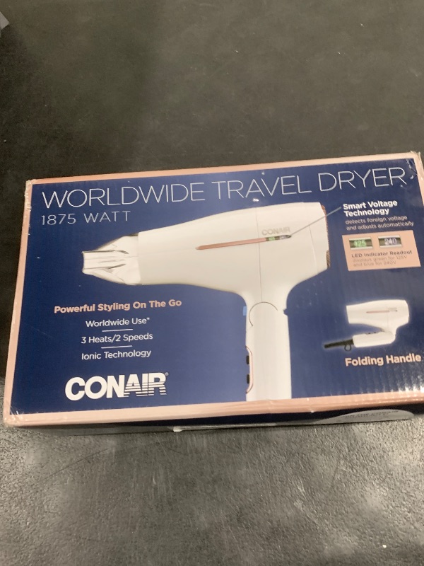 Photo 1 of Conair Hair Dryer, Worldwide Travel Hair Dryer with Smart Voltage Technology and Folding Handle, Includes Concentrator