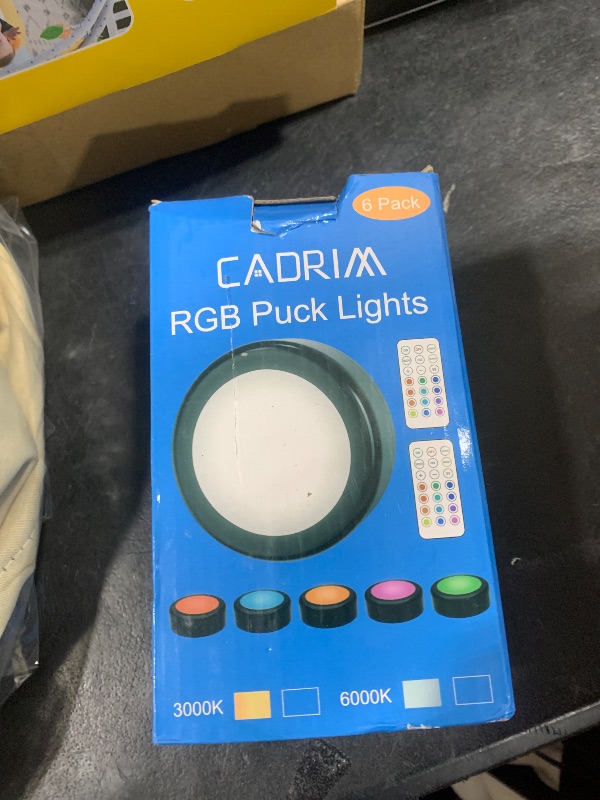 Photo 1 of Cadrim Puck Lights, 6 Pack 13 Colors Changeable LED Puck lightings Battery Powered Dimmable Under Cabinet Lights, Battery Powered Under Counter Lights with 2 Wireless Remote Controls, Black