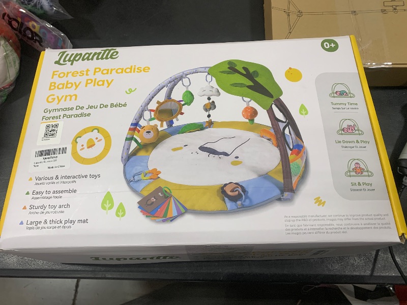 Photo 1 of Lupantte Baby Gym Play Mat with 9 Toys for Sensory and Motor Skill Development Language Discovery, Thicker Non-Slip Activity Ball Pit, Green Tree Newborns, Babies to Toddlers as Gift