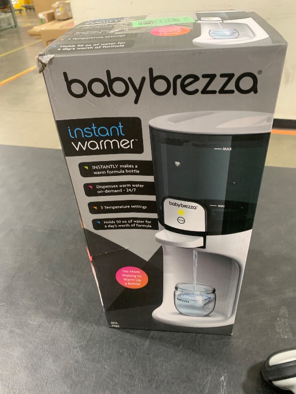 Photo 1 of Baby Brezza Instant Baby Bottle Warmer - Fast Water Warmer Instantly Dispenses 24/7 in 3 Temperatures, White