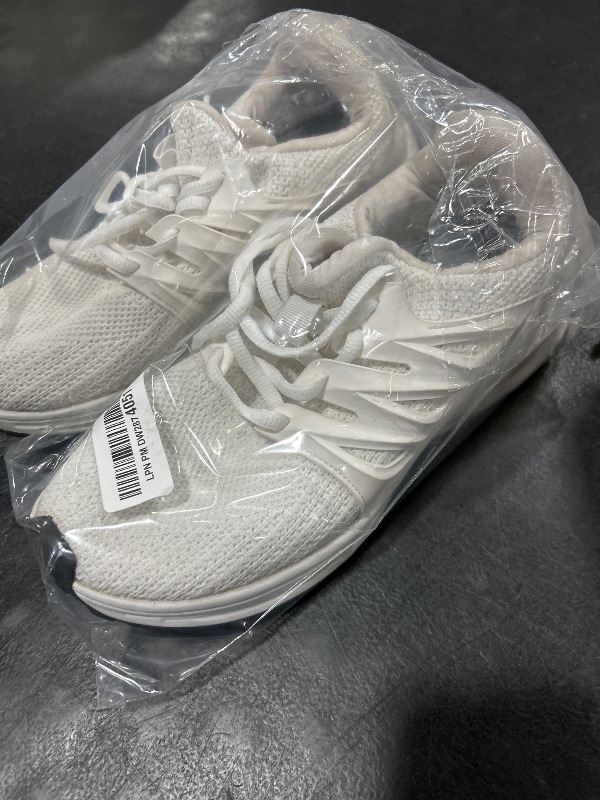 Photo 1 of USED TENNIS SHOES 