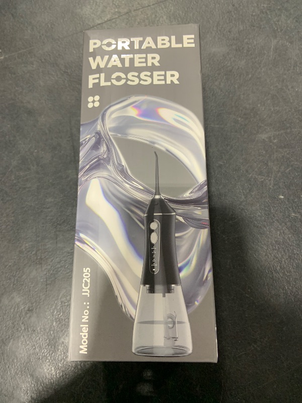 Photo 1 of Water Flosser for Teeth Cleaning and Flossing, 5 Modes Rechargeable Cordless Oral Irrigator 320ml Water Tank Teeth Cleaner, IPX7 Waterproof Portable Electric Dentel Flossers for Home and Travel,Black