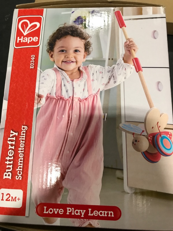 Photo 1 of Award Winning Hape Butterfly Wooden Push and Pull Walking Toy, L: 6.3, W: 5.8, H: 22.2 inch, Red