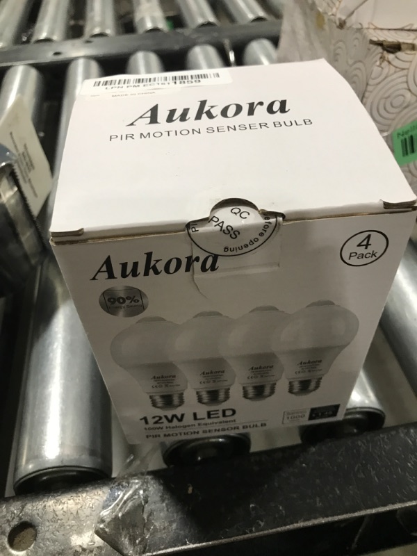 Photo 1 of Aukora Motion Sensor Light Bulbs 4-Pack, 12W (100-Watt Equivalent) E26 Motion Activated Dusk to Dawn Security Light Bulb Outdoor/Indoor for Front Door Porch Garage Basement Hallway Closet(Warm White)