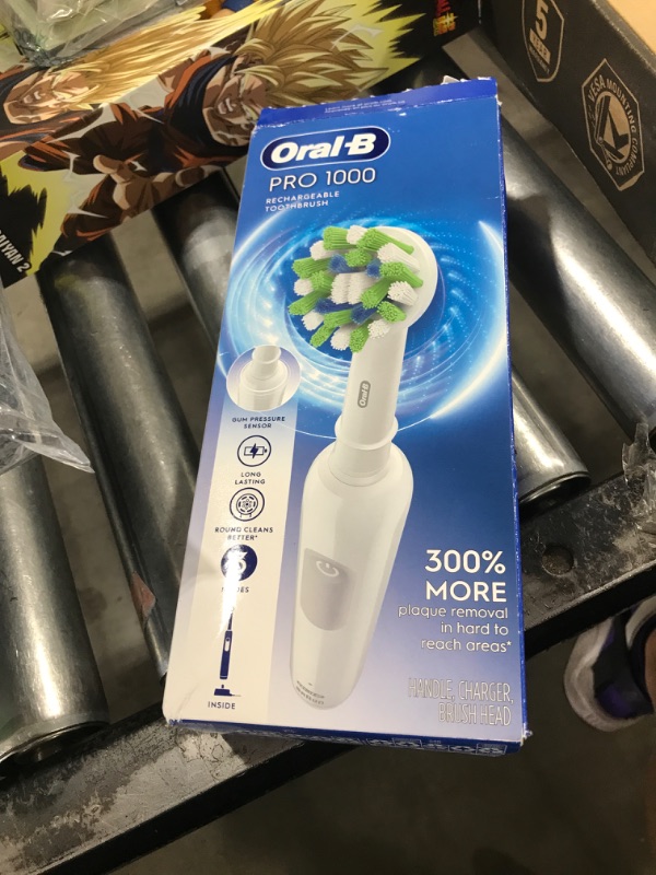 Photo 1 of Oral-B Pro 1000 Rechargeable Electric Toothbrush, White