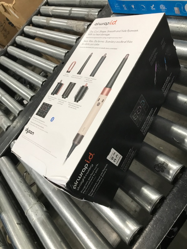 Photo 1 of Dyson Airwrap i.d.™ Multi-Styler and Dryer Straight+Wavy in Ceramic Pink and Rose Gold