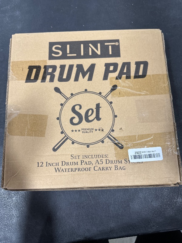 Photo 1 of SLINT Drum Practice Pad and Sticks