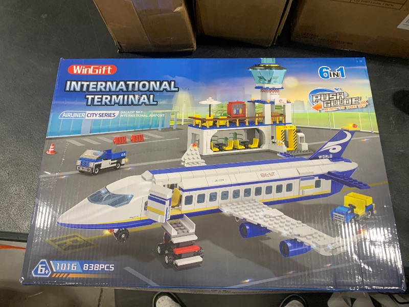 Photo 1 of WinGift 886 Pcs City Airport Passenger Terminal Building Set, 6 IN 1 Airplane Building Blocks Toy, STEM Aircraft Bricks with Shuttle Bus,Luggage Cart,Planes Model Toys Gifts for Adults Boys Ages 6-12+