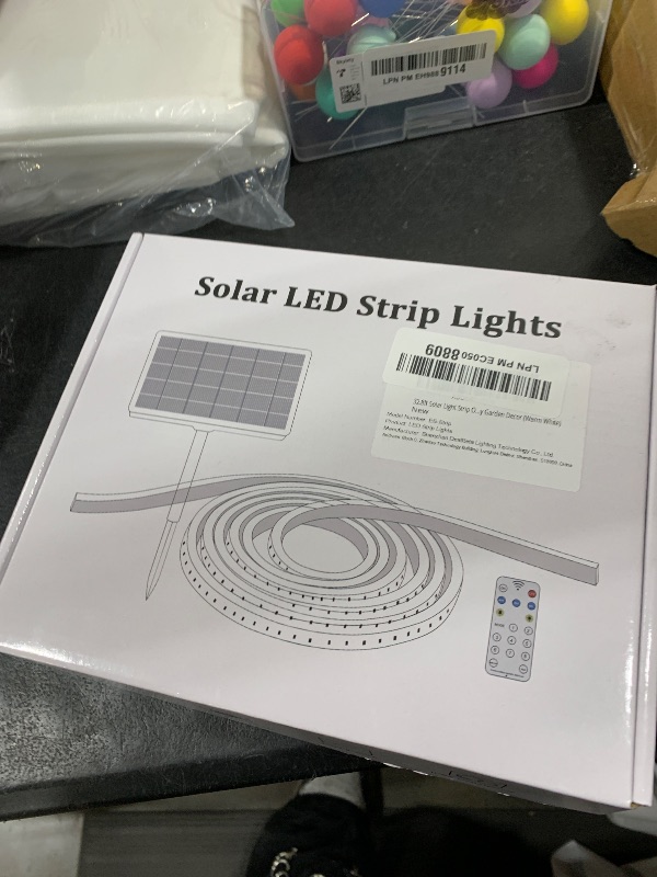 Photo 1 of 32.8Ft Solar Strip Lights Outdoor, IP68 Fully Waterproof LED Strip Lights with Timer Remote Auto ON/Off, Self-Adhesive Strip Lights for Camping Pool Patio Decor (Warm White)