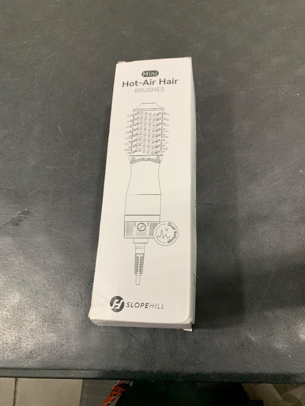 Photo 1 of Slopehill Mini Dual Voltage Hair Dryer Brush,1000 Watts Travel Hot Air Brush with European Plug, Ionic One Step Hair Dryer and Styler for Women for Home & Salon, 2 Heat & 2 Speed Settings