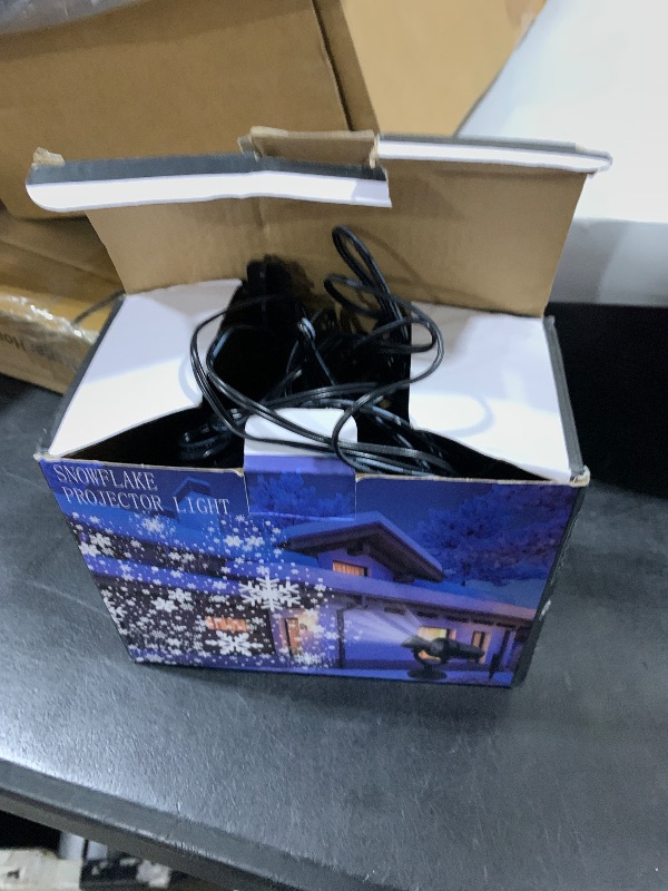 Photo 1 of Fussion Snowflake Christmas Projector Lights Outdoor, Double-Head Snowflake Projector Lights Waterproof, Holiday Projector Lighting Outdoor with Timer for Outside Indoor Wall Window Christmas Decor