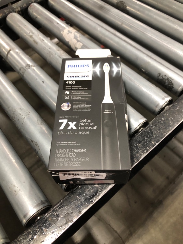 Photo 1 of Philips Sonicare 4100 Rechargeable Electric Toothbrush, with Pressure Sensor, 2 Intensity Settings, SmarTimer and QuadPacer, 14-Day Battery Life, Black, Model HX3681/24