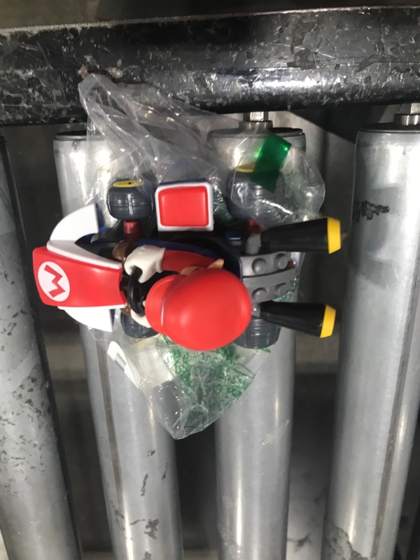 Photo 1 of Super Mario Spin Out Mariokart Mario Racer Vehicle with 360 Spins, Wind Up and Go! Includes One 2.5” Mario Action Figure