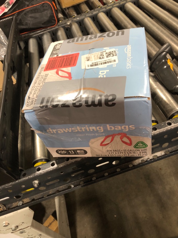 Photo 1 of Amazon Basics 13 Gallon Tall Kitchen Drawstring Trash Bags, Clean Fresh Scnet, 10% Post Consumer Recycled, 200 Count