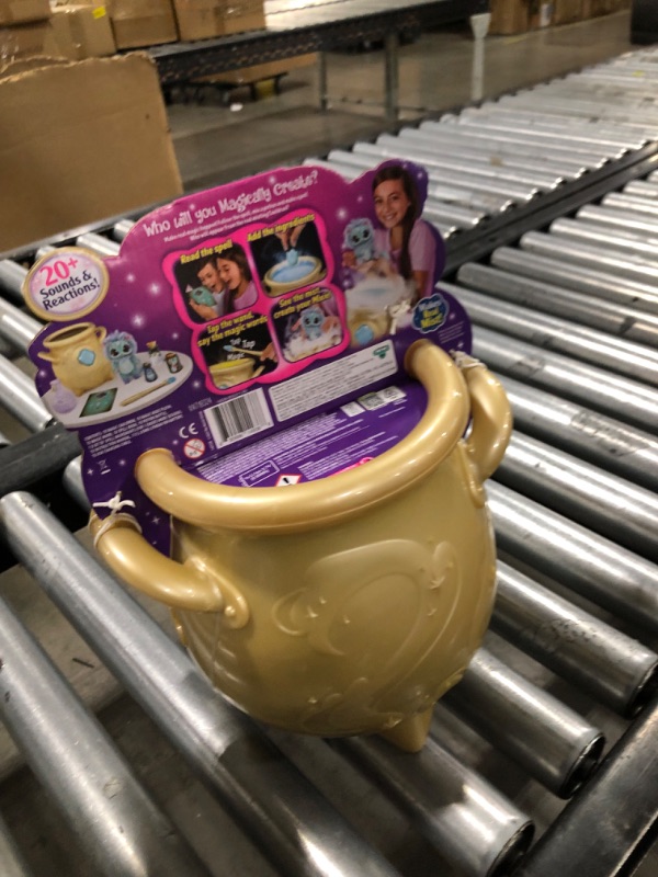 Photo 1 of Magic Mixies - Magical Real Misting Gold Cauldron with 8 Inch Non-Electronic Plush Toy. Follow The Spell Book Add The Magic Ingredients. Who Will You Magically Create?
