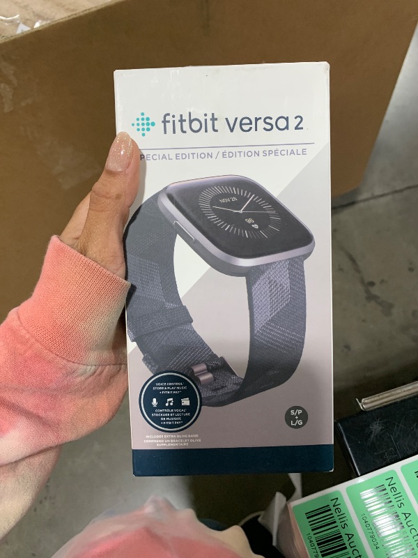 Photo 1 of Fitbit Versa 2 Special Edition Health and Fitness Smartwatch with Heart Rate, Music, Alexa Built-In, Sleep and Swim Tracking, Smoke Woven/Mist Grey, One Size (S and L Bands Included)