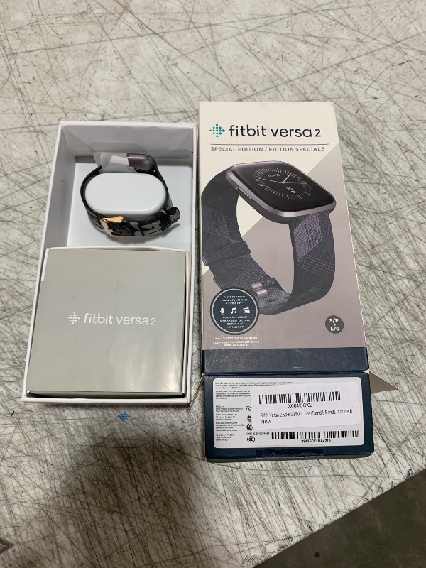 Photo 1 of Fitbit Versa 2 Special Edition Health and Fitness Smartwatch with Heart Rate, Music, Alexa Built-In, Sleep and Swim Tracking, Smoke Woven/Mist Grey, One Size (S and L Bands Included)