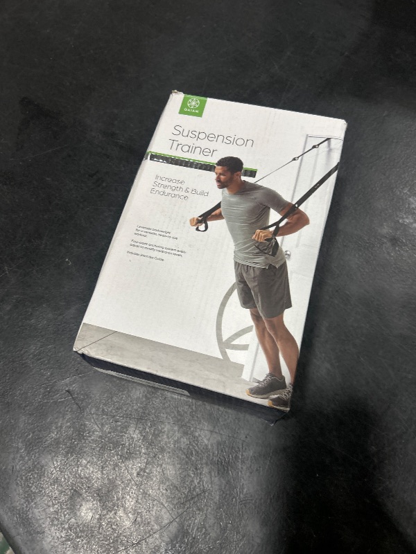 Photo 1 of Gaiam Suspension Trainer System for All Fitness Levels - Increase Strength and Build Endurance - Four-Point Anchoring System with 2" W Nylon Straps - Attaches to Any Door - Exercise Guide Included