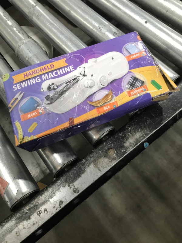 Photo 1 of Handheld Sewing Machine, Battery Operated Mini Sewing Machines for Beginners, Fast Stitching Electric Hand Sewing Machine with Accessory Kit, Hand Stitching Machine for DIY Fabrics Clothes Home Travel