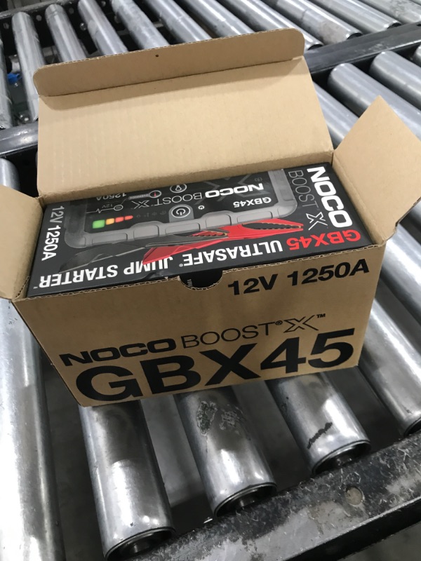 Photo 1 of NOCO Boost X GBX45 1250A 12V UltraSafe Portable Lithium Jump Starter, Car Battery Booster Pack, USB-C Powerbank Charger, and Jumper Cables for up to 6.5-Liter Gas and 4.0-Liter Diesel Engines