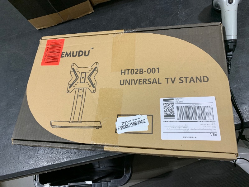 Photo 1 of Universal Swivel TV /Table Top TV Stand for 19 to 43 inch TVs with 90 Degree Swivel, 4 Level Height Adjustable, Heavy Duty Tempered Glass Base, Holds up to 99LBS HT02B-001