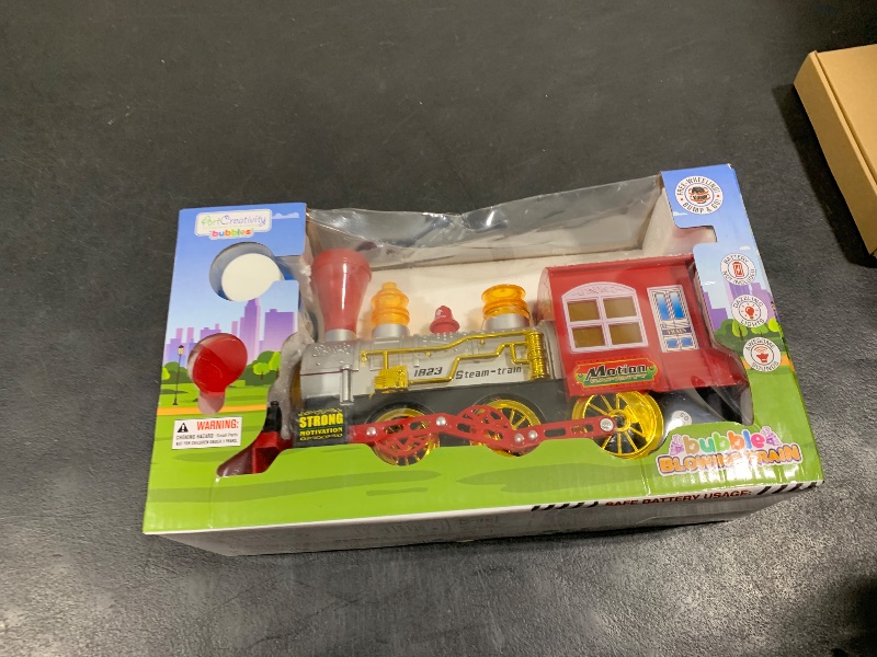Photo 1 of ArtCreativity Bubble Blowing Toy Train with Lights & Sounds, Bump and Go Toddler Train Toys for Around The Tree, Kids Bubble Machine, for Boys & Girls Ages 1-6