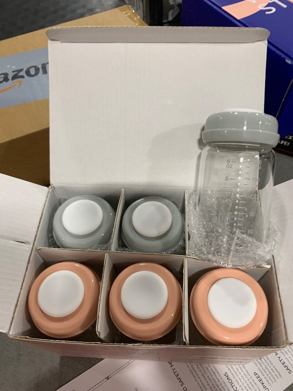 Photo 1 of COMI Wide Neck Glass Breastmilk Collection n Storage Bottle, 4 Packs, 6oz with Screw Ring Sealing Disk; Re-markable Sealing Disc. BPA Free, Fits Breast Pumps & Nipples (3 Gray Lids + 3 Pink Lids)