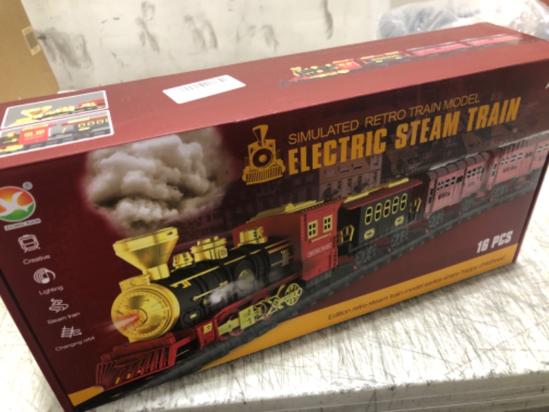 Photo 1 of Christmas Train Set with Smoke, Lights, and Sound - Ideal Gift for Toddlers and Kids Ages 2-8, Classic Electric Train Set for Under The Tree, Holiday Decoration for Boys & Girls