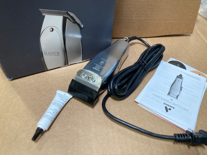 Photo 1 of Andis 01815 Professional Master Adjustable Blade Hair Trimmer, Carbon Steel T-Blade - Silver