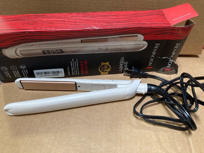 Photo 1 of Remington Shine Therapy 1 inch Hair Straightener Iron, Flat Iron for Hair Infused with Argan Oil & Keratin, Professional Ceramic Flat Iron for Less Frizz, Shinier & Smoother Hair, Hair Styling Tools