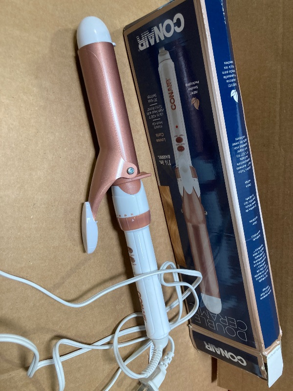 Photo 1 of Conair Double Ceramic 1 1/4-Inch Curling Iron, 1 ¼ inch barrel produces loose curls – for use on medium and long hair