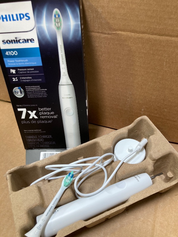 Photo 1 of Philips Sonicare 4100 Rechargeable Electric Toothbrush, with Pressure Sensor, 2 Intensity Settings, SmarTimer and QuadPacer, 14-Day Battery Life, White, Model HX3681/23