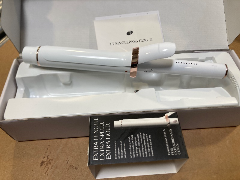 Photo 1 of T3 SinglePass Curl X Extra-Long Barrel Curling Iron with 9 Heat Settings and Ceramic Barrel for Fast Styling and Lasting Results on All Hair Types