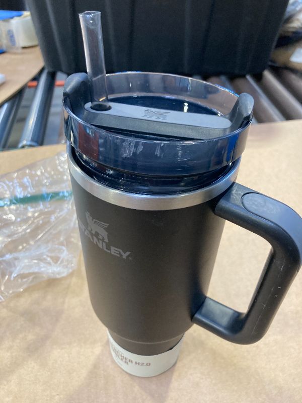 Photo 1 of Stanley Quencher H2.0 Tumbler with Handle and Straw 40 oz | Flowstate 3-Position Lid | Cup Holder Compatible for Travel | Insulated Stainless Steel Cup | BPA-Free | Black 2.0