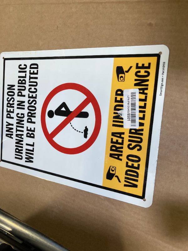 Photo 1 of SmartSign 14 x 10 inch “Any Person Urinating In Public Will Be Prosecuted - Area Under Video Surveillance” Metal Sign, 40 mil Laminated Rustproof Aluminum, Multicolor, Made in USA