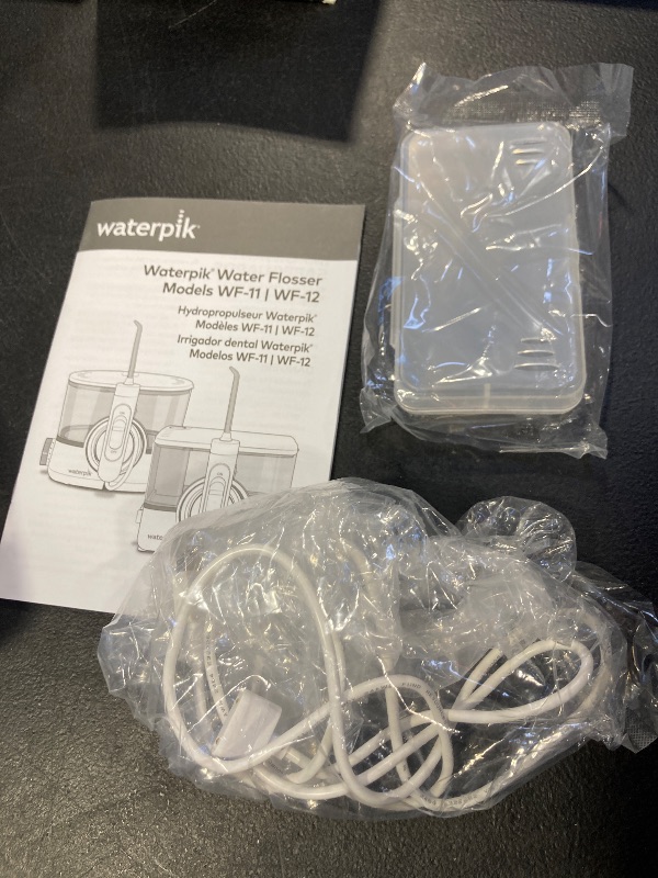 Photo 1 of Waterpik ION Professional Water Flosser, Rechargeable and Portable for Teeth, Gums, Braces, 10 Settings, 7 Flossing Tips For Multiple Users And Needs, ADA Accepted, WF-12 White