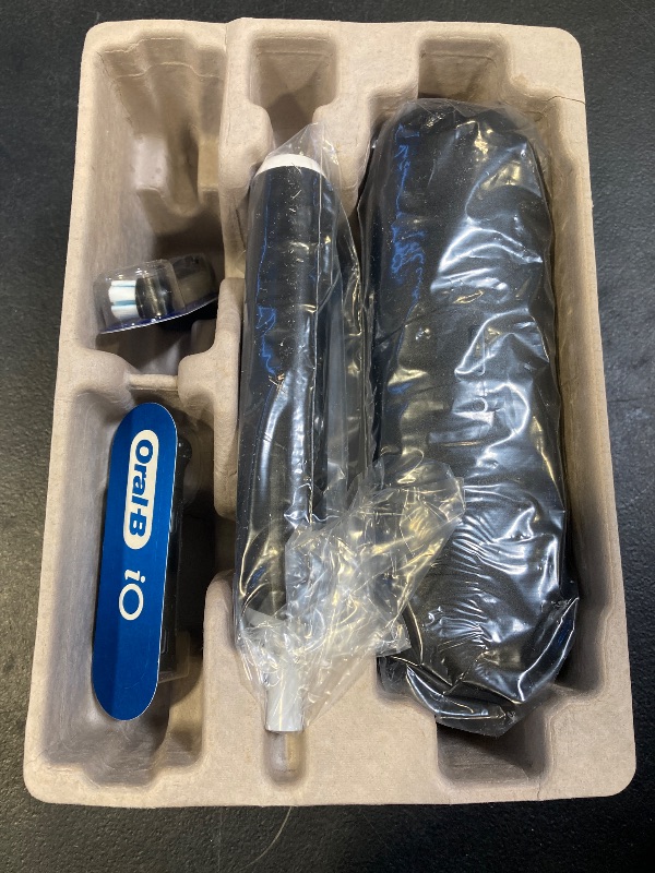 Photo 1 of Oral-B iO Deep Clean Rechargeable Electric Powered Toothbrush, Black with iO Series 3 Limited, 2 Brush Heads and Travel Case - Pressure Sensor to Protect Gums - 3 Cleaning Settings - 2 Minute Timer