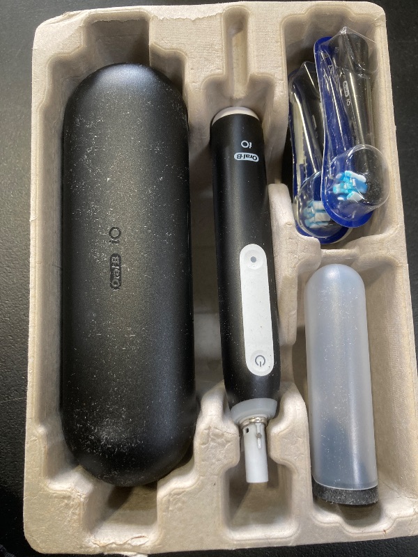 Photo 1 of Oral-B iO Deep Clean Rechargeable Electric Powered Toothbrush, Black with iO Series 3 Limited, 2 Brush Heads and Travel Case - Pressure Sensor to Protect Gums - 3 Cleaning Settings - 2 Minute Timer